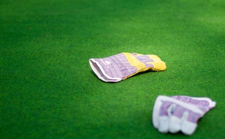 Gloves Lying on Turf